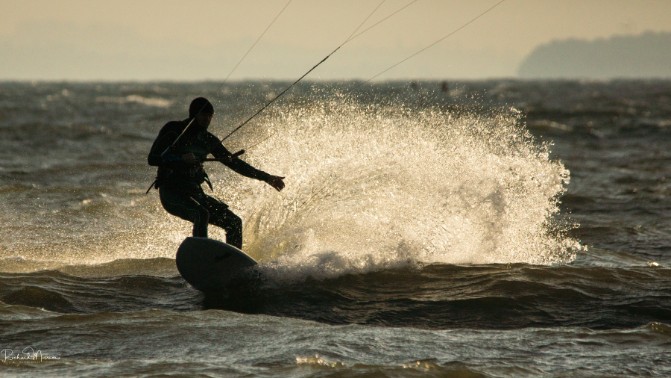 Kite surfing Kitesurfing is a surface water sport combining aspects of wakeboarding, windsurfing, surfing, paragliding, and...